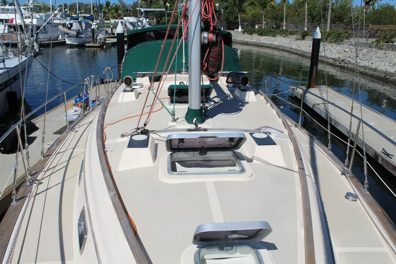  Yacht Photos Pics 1994 Island Packet 40 sailboat deck view at marina, showcasing rigging and hatches.