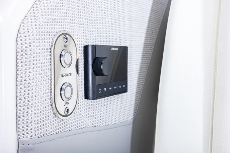  Yacht Photos Pics Control panel on 2025 Tiara Yachts 43 LE, featuring buttons and a Fusion audio system.