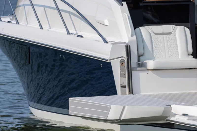  Yacht Photos Pics 2025 Tiara Yachts 43 LE luxury boat with sleek design and comfortable seating.