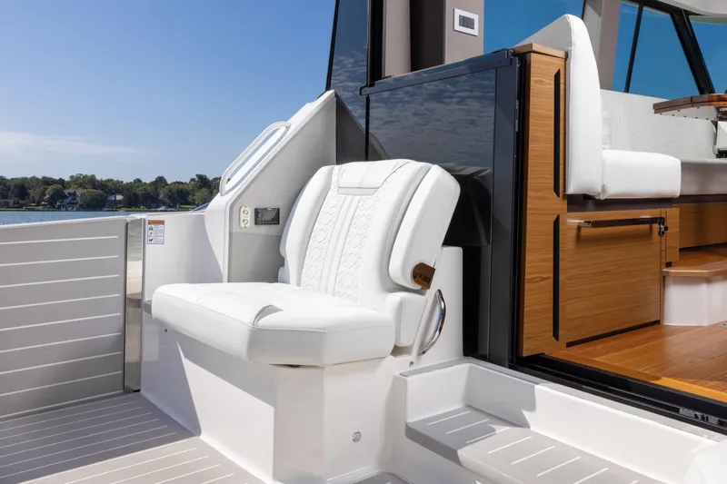  Yacht Photos Pics 2025 Tiara Yachts 43 LE interior with white seating and wooden accents.