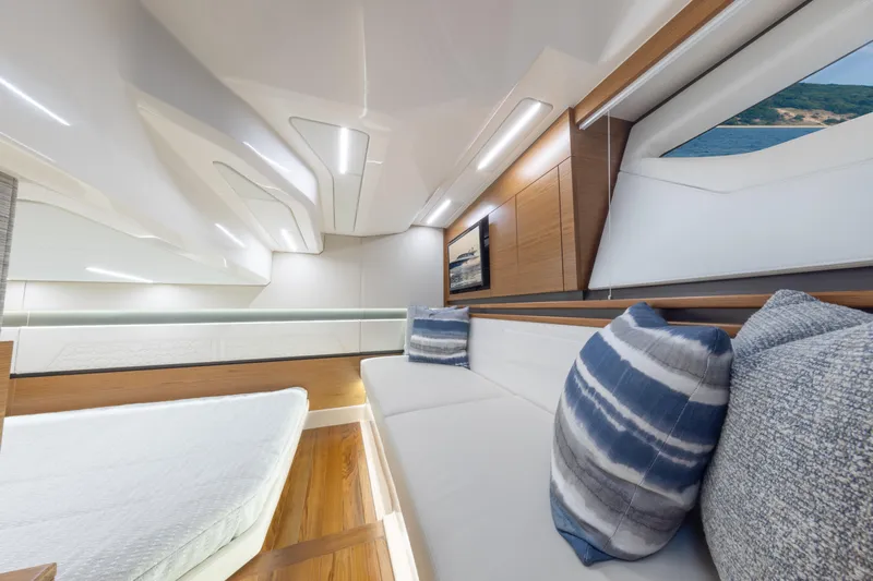  Yacht Photos Pics Luxurious interior of 2025 Tiara Yachts 43 LE, featuring modern design and comfortable seating.