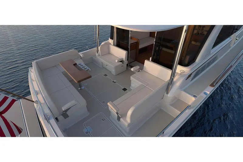  Yacht Photos Pics Manufacturer Provided Image: Luxurious 2026 Sabre 51 Salon Express yacht with spacious outdoor seating area.