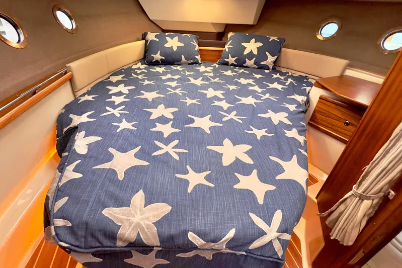 Yacht Photos Pics Interior of 2023 Ranger Tugs R-29 S with nautical bedding.