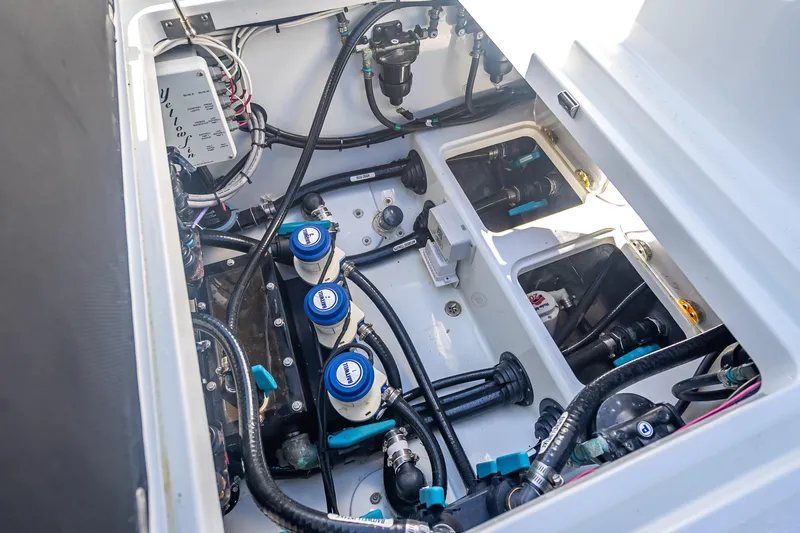  Yacht Photos Pics 2023 Yellowfin 39 Offshore boat engine compartment with wiring and components.