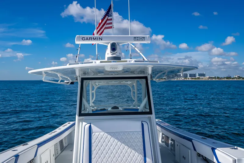  Yacht Photos Pics 2023 Yellowfin 39 Offshore boat on open sea with clear blue sky.