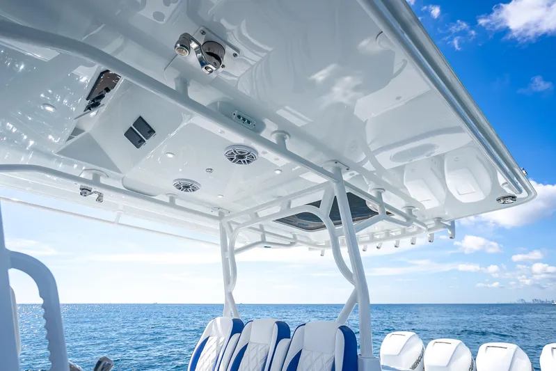  Yacht Photos Pics 2023 Yellowfin 39 Offshore boat interior with ocean view and blue sky.