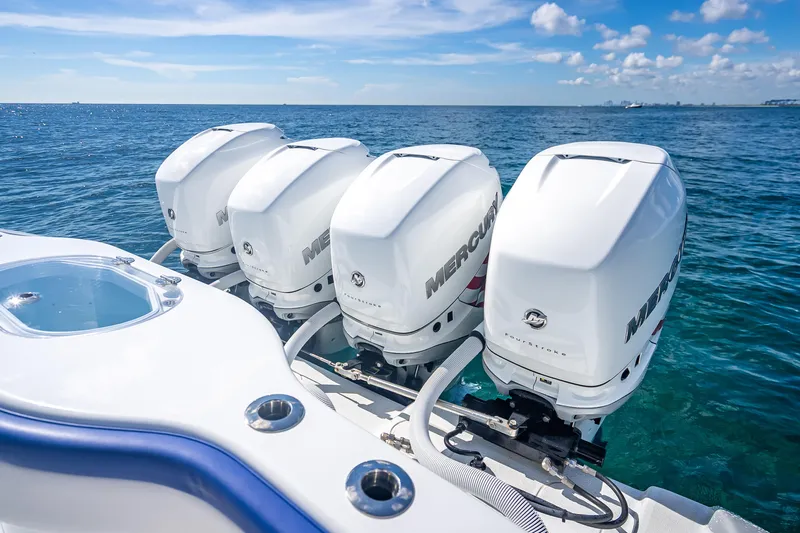  Yacht Photos Pics 2023 Yellowfin 39 Offshore boat with four Mercury outboard engines on open water.