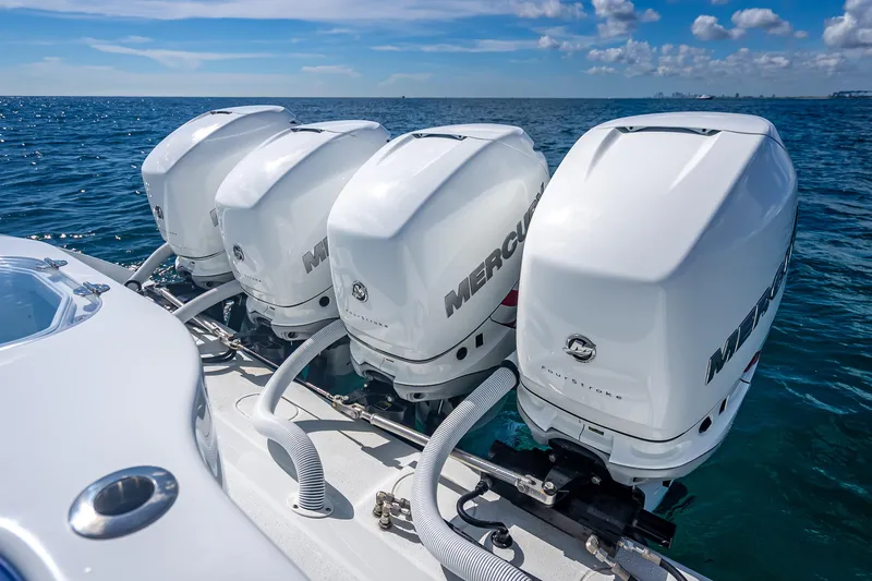  Yacht Photos Pics Four powerful Mercury outboard engines on a 2023 Yellowfin 39 Offshore boat in open water.