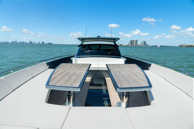 Pura Vida Yacht Photos Pics 2024 CNM CONTINENTAL 54 SuperSport yacht on open water, featuring sleek design and luxury amenities.