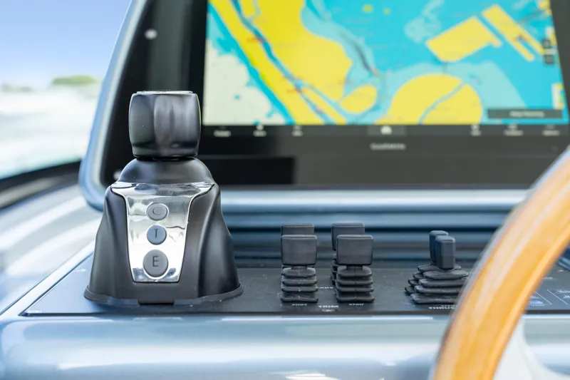 Pura Vida Yacht Photos Pics Control panel of 2024 CNM CONTINENTAL 54 SuperSport with navigation display.