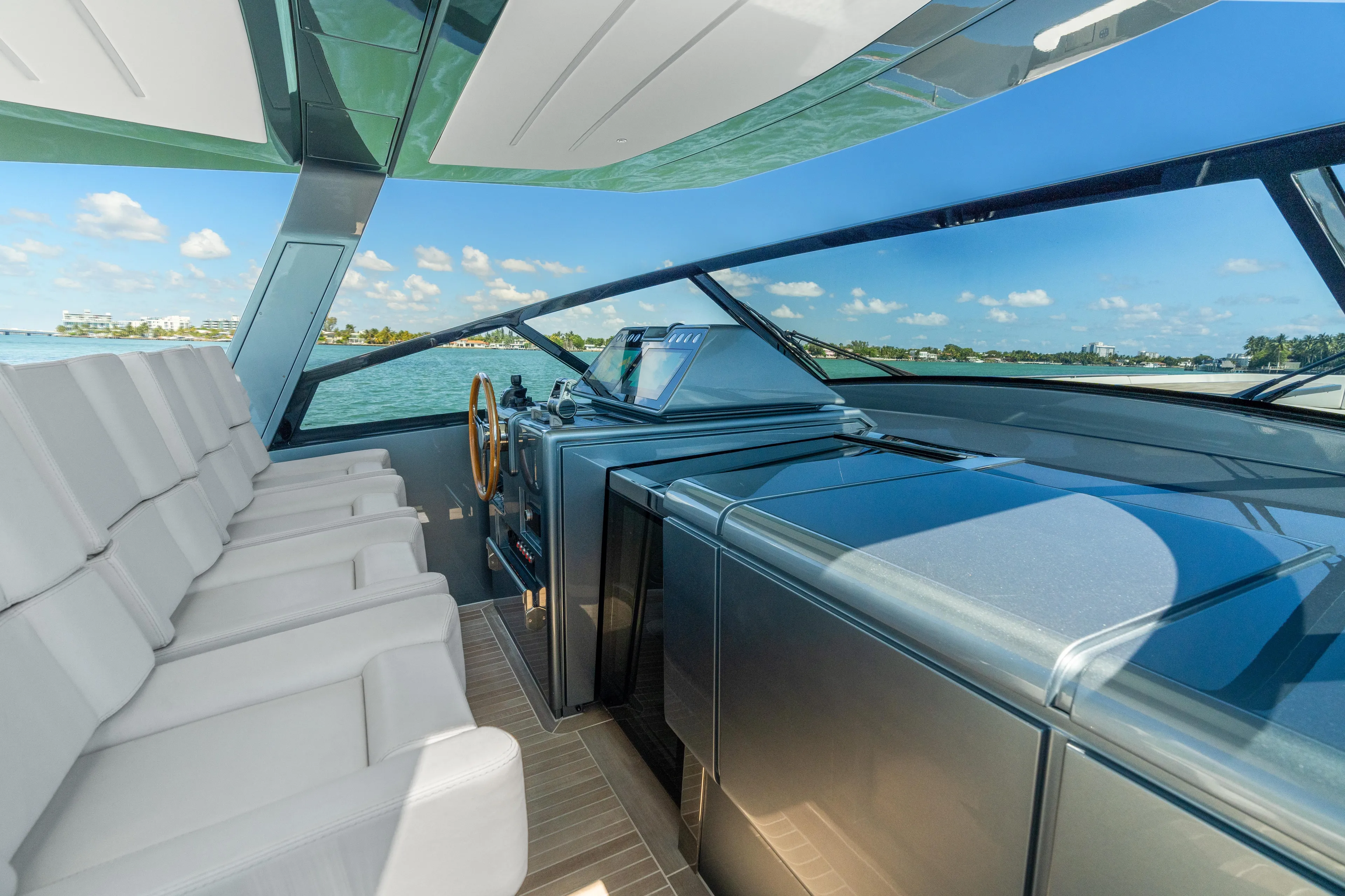 Pura Vida Yacht Photos Pics 2024 CNM CONTINENTAL 54 SuperSport yacht interior with sleek design and ocean view.
