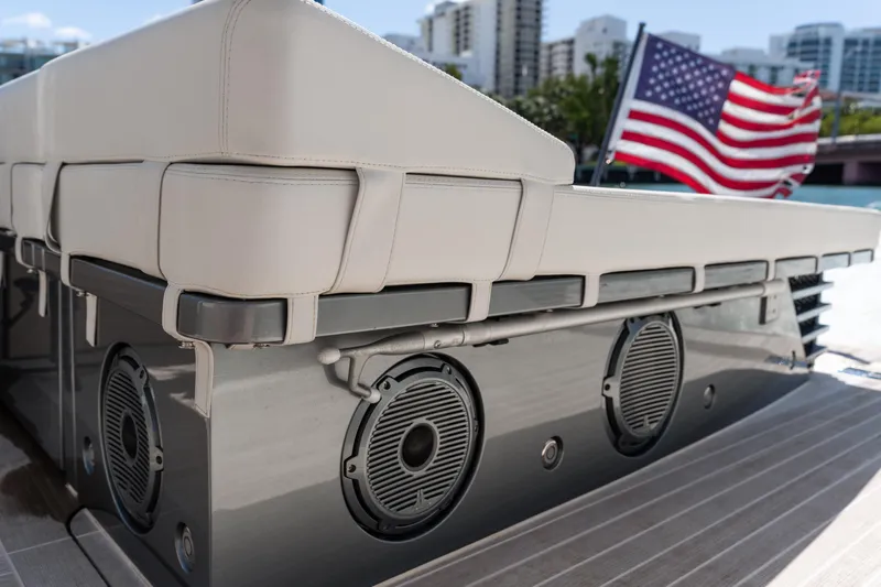 Pura Vida Yacht Photos Pics 2024 CNM CONTINENTAL 54 SuperSport yacht with speakers and American flag.