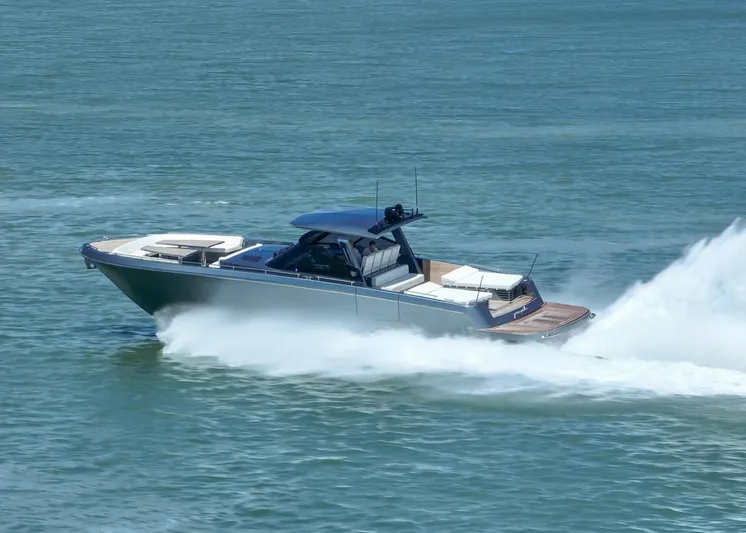 Pura Vida Yacht Photos Pics 2024 CNM CONTINENTAL 54 SuperSport yacht speeding on open water.
