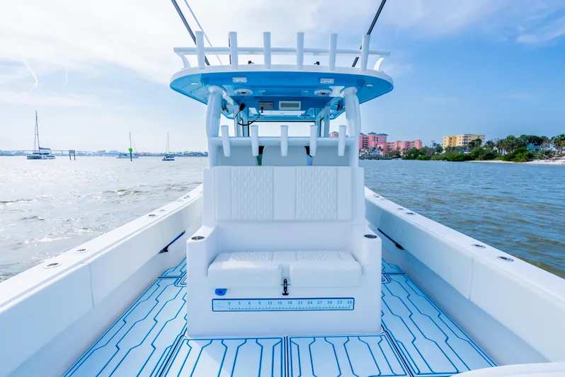  Yacht Photos Pics 2025 Insetta 35IFC boat interior with modern seating, on a sunny day at sea.