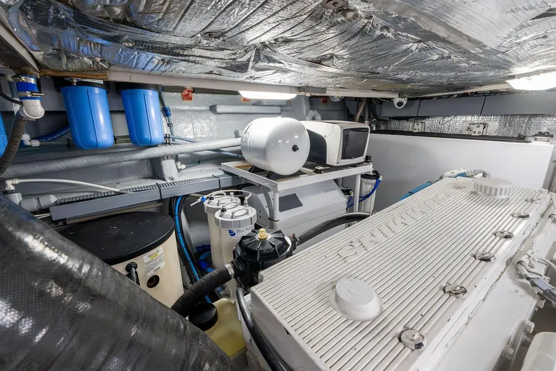 Prana Yacht Photos Pics Engine room of a 1995 Itama 46 yacht, featuring mechanical equipment and components.