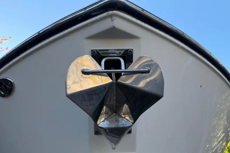  Yacht Photos Pics Bow of 2017 Pursuit DC 295 Dual Console with heart-shaped anchor detail.