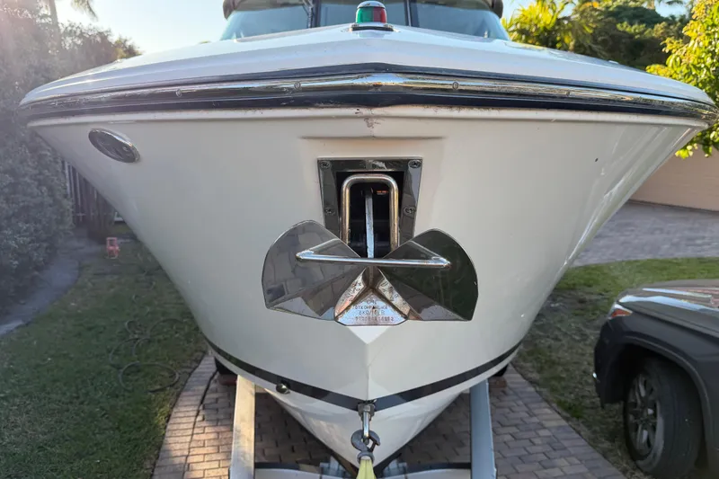 Yacht Photos Pics 2017 Pursuit DC 295 Dual Console boat on trailer, front view.