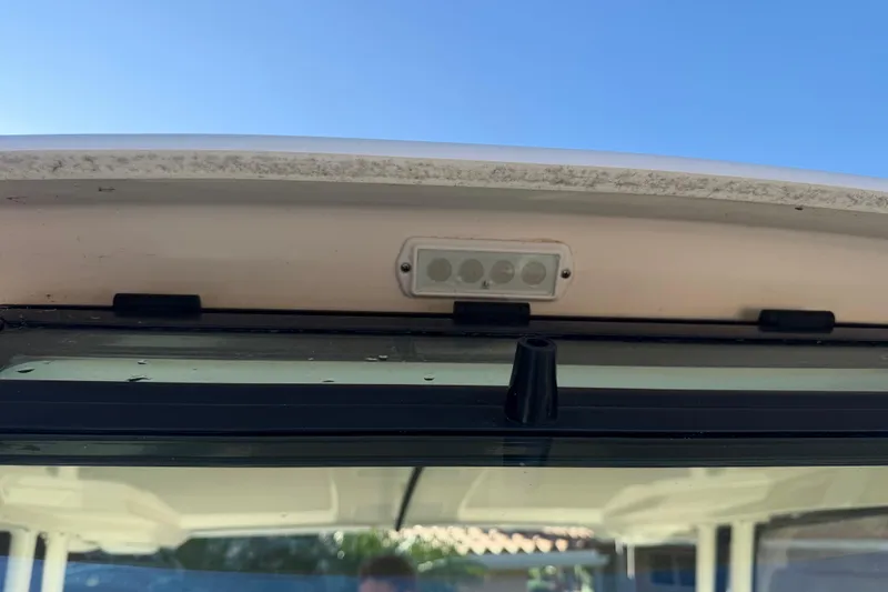  Yacht Photos Pics 2017 Pursuit DC 295 Dual Console boat windshield and LED light detail.