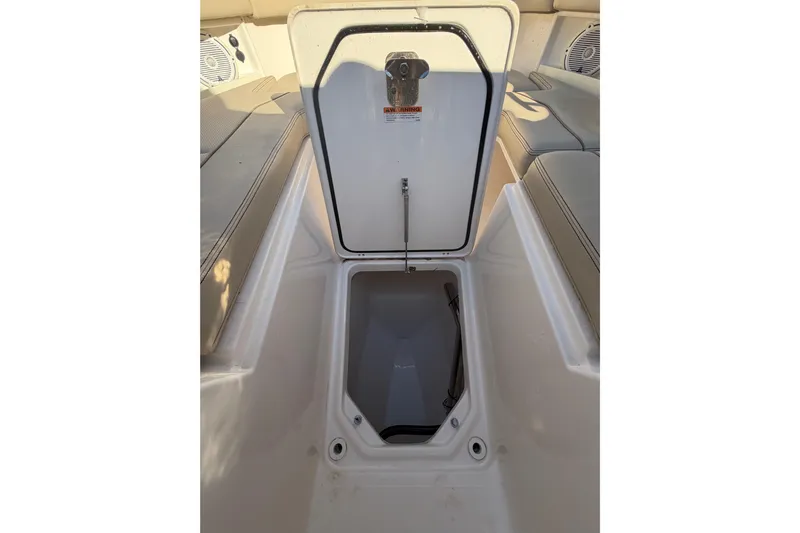  Yacht Photos Pics Open storage compartment on 2017 Pursuit DC 295 Dual Console boat.