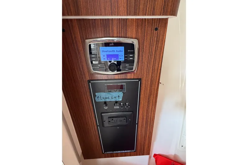  Yacht Photos Pics 2017 Pursuit DC 295 Dual Console audio control panel with Bluetooth functionality.