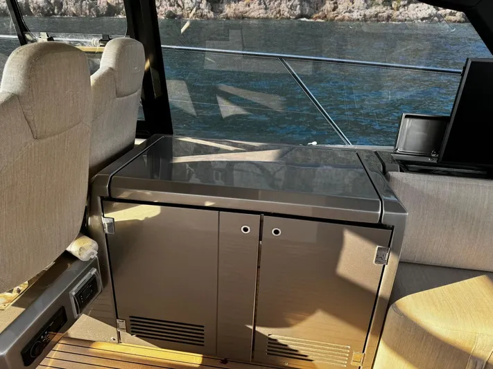  Yacht Photos Pics Interior of 2022 Azimut Atlantis 51 yacht with modern seating and cabinetry.