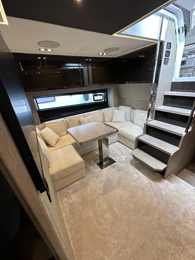  Yacht Photos Pics Luxurious interior of 2022 Azimut Atlantis 51 yacht with plush seating and modern design.