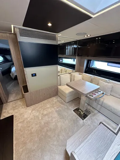  Yacht Photos Pics Luxurious interior of 2022 Azimut Atlantis 51 yacht with modern seating and elegant design.
