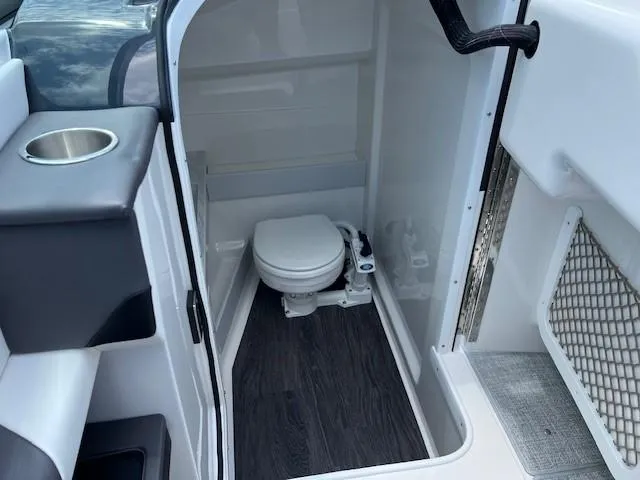 2025 Formula 290 Br Yacht Photos Pics 2025 Formula 290 Bowrider interior bathroom with toilet and sink.
