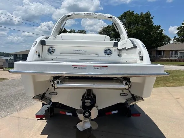2025 Formula 290 Br Yacht Photos Pics 2025 Formula 290 Bowrider boat rear view on trailer, outdoor setting.