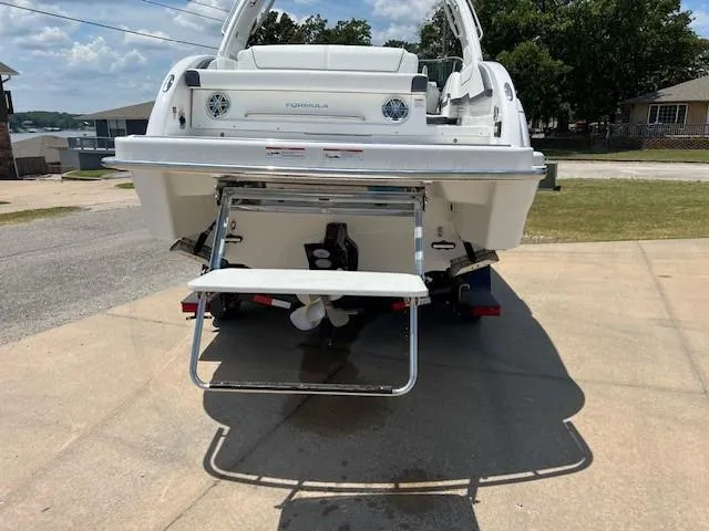 2025 Formula 290 Br Yacht Photos Pics 2025 Formula 290 Bowrider boat rear view with swim platform and ladder.