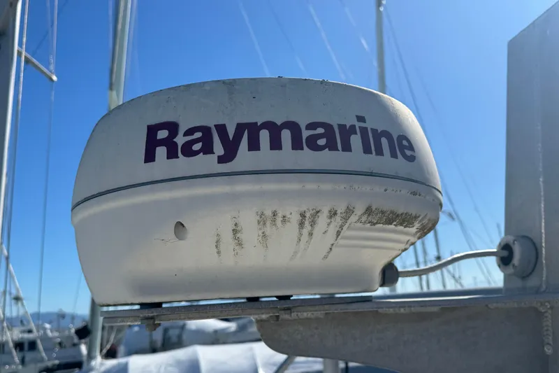  Yacht Photos Pics Raymarine radar on 2005 Ocean Sport Roamer 30 boat under clear blue sky.