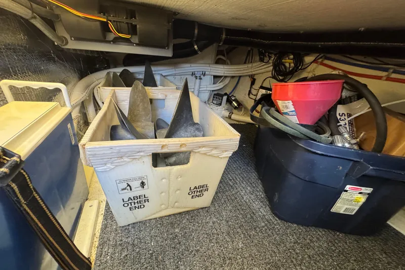  Yacht Photos Pics Storage area in a 2005 Ocean Sport Roamer 30 boat with equipment and containers.