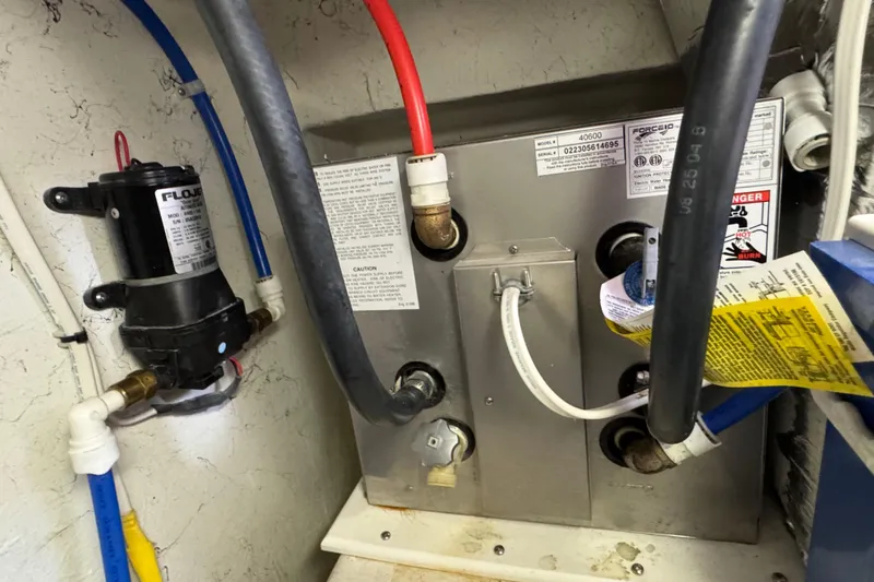  Yacht Photos Pics Boat engine compartment with plumbing and electrical components, Ocean Sport Roamer 30, 2005 model.