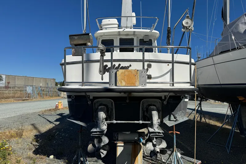  Yacht Photos Pics 2005 Ocean Sport Roamer 30 boat on dry dock, rear view with dual propellers.