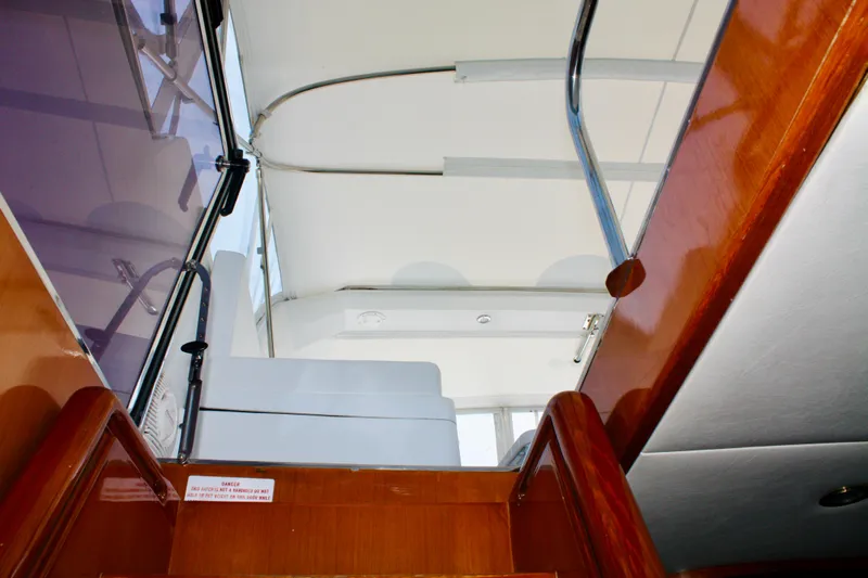  Yacht Photos Pics Interior stairs of a 2000 Jefferson 56 Rivanna yacht.