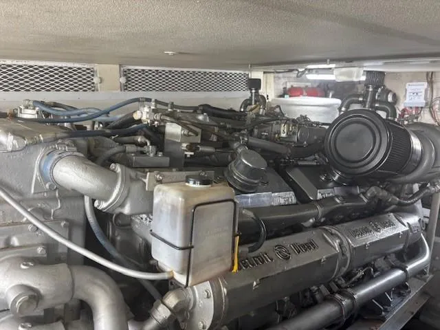 Dry-hydro Yacht Photos Pics Engine of a 1990 Viking Convertible boat, showcasing detailed mechanical components.