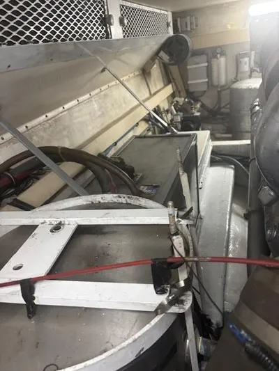 Dry-hydro Yacht Photos Pics Engine room of a 1990 Viking Convertible boat, showcasing mechanical components and wiring.