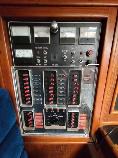 Trinity Yacht Photos Pics Control panel of a 1997 Hylas 46 yacht with switches and gauges.