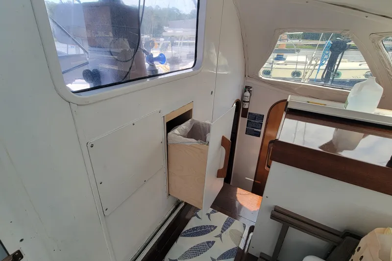 Freedom Yacht Photos Pics Interior of 1993 Lagoon 42 sailboat, featuring windows and wooden accents.