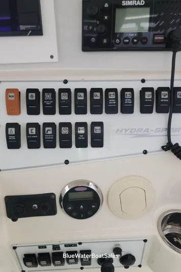  Yacht Photos Pics Control panel of 2008 Hydra-Sports Vector 3500 VX boat with Simrad electronics.