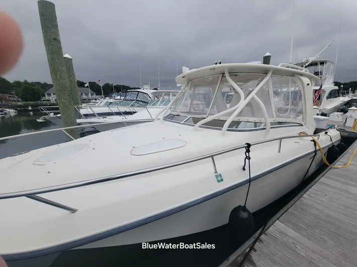  Yacht Photos Pics 2008 Hydra-Sports Vector 3500 VX boat docked at marina, overcast sky.