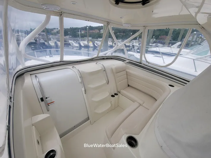  Yacht Photos Pics 2008 Hydra-Sports Vector 3500 VX boat interior with seating and marina view.