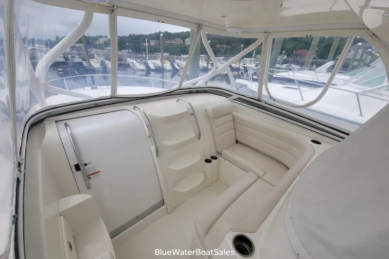  Yacht Photos Pics 2008 Hydra-Sports Vector 3500 VX boat interior with white seating and marina view.