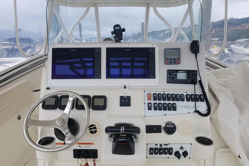 Yacht Photos Pics 2008 Hydra-Sports Vector 3500 VX helm with dual Simrad displays and control panel.
