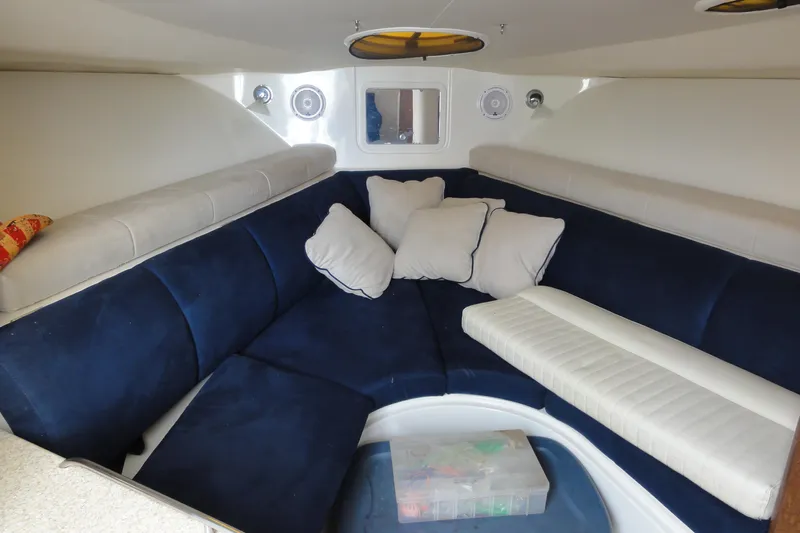  Yacht Photos Pics 2008 Hydra-Sports Vector 3500 VX cabin interior with blue seating and cushions.