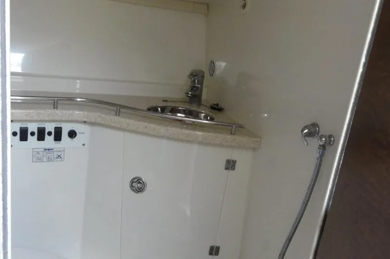  Yacht Photos Pics 2008 Hydra-Sports Vector 3500 VX boat interior with sink and control panel.