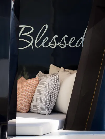 Blessed Yacht Photos Pics Luxurious Sunreef 50 A yacht interior with decorative cushions, 2024 model.