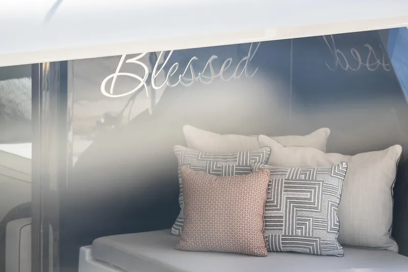 Blessed Yacht Photos Pics Luxurious Sunreef 50 A yacht interior with stylish cushions, 2024 model.