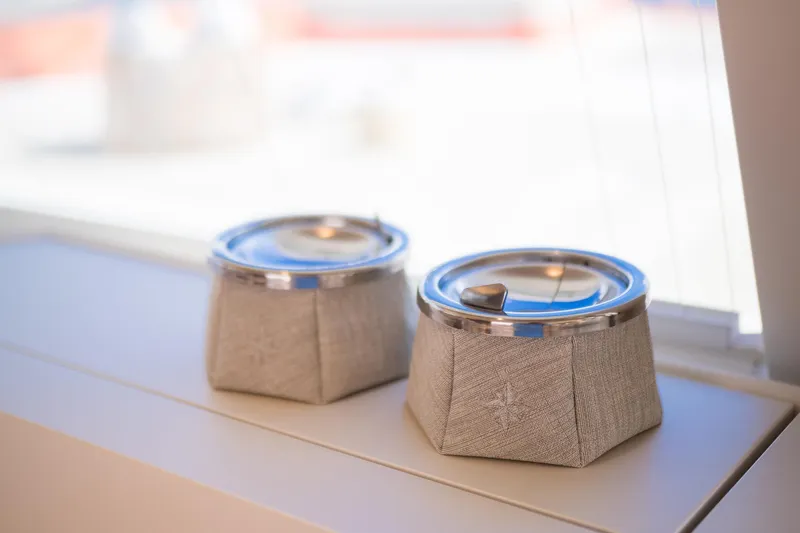 Blessed Yacht Photos Pics Two stylish containers with metal lids on a Sunreef 50 A yacht, 2024 model.