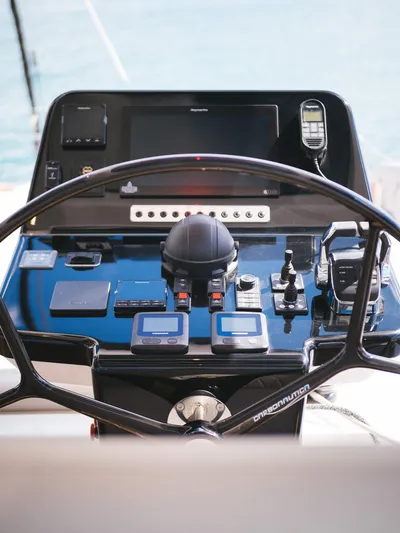 Blessed Yacht Photos Pics Helm of 2024 Sunreef 50 A yacht with advanced navigation controls.